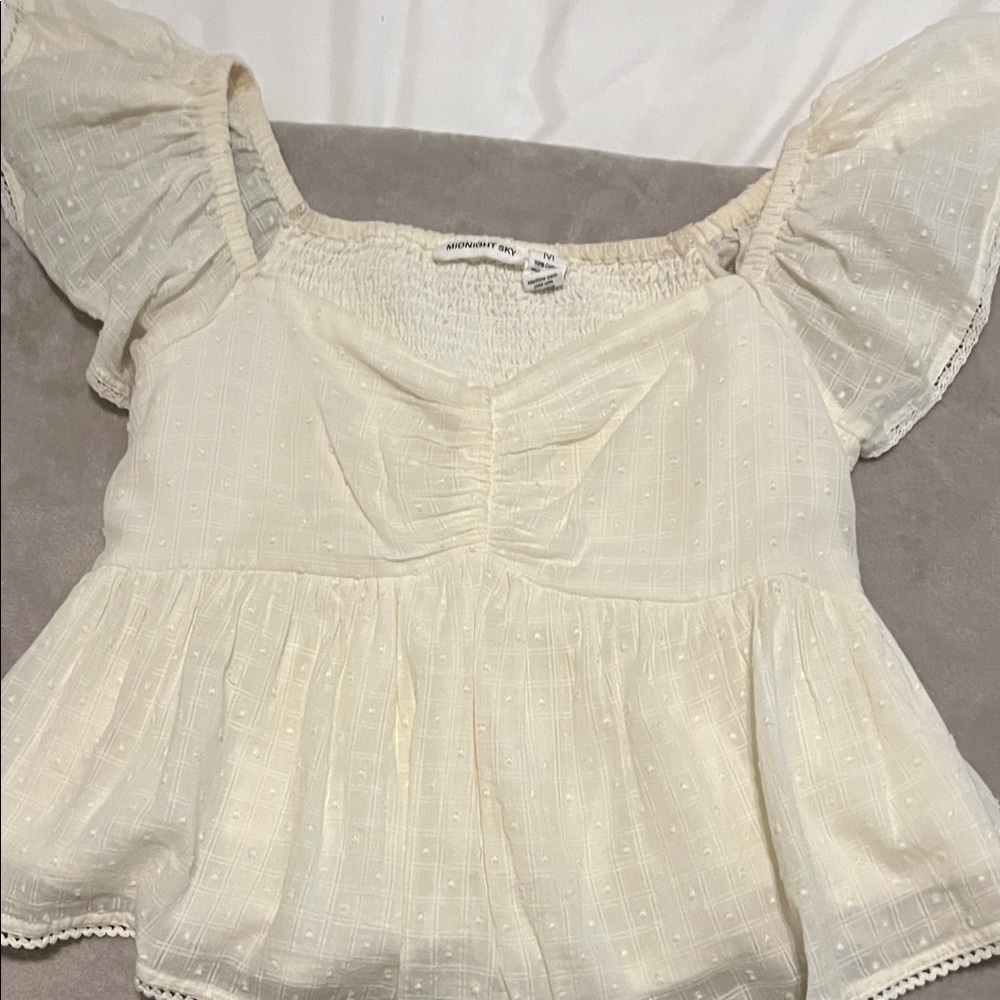 Charming Cream Blouse with Ruffled Sleeves